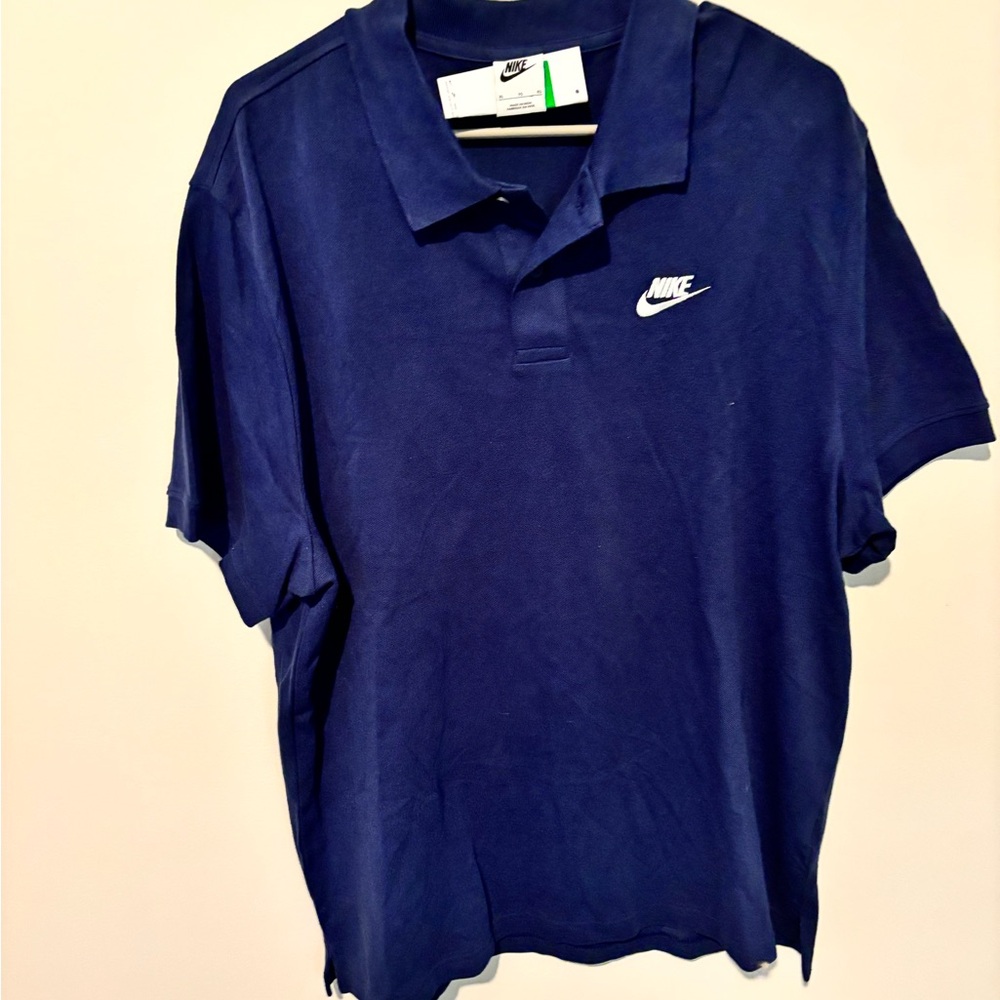 Nike Men’s Dark Blue Polo with White Swoosh